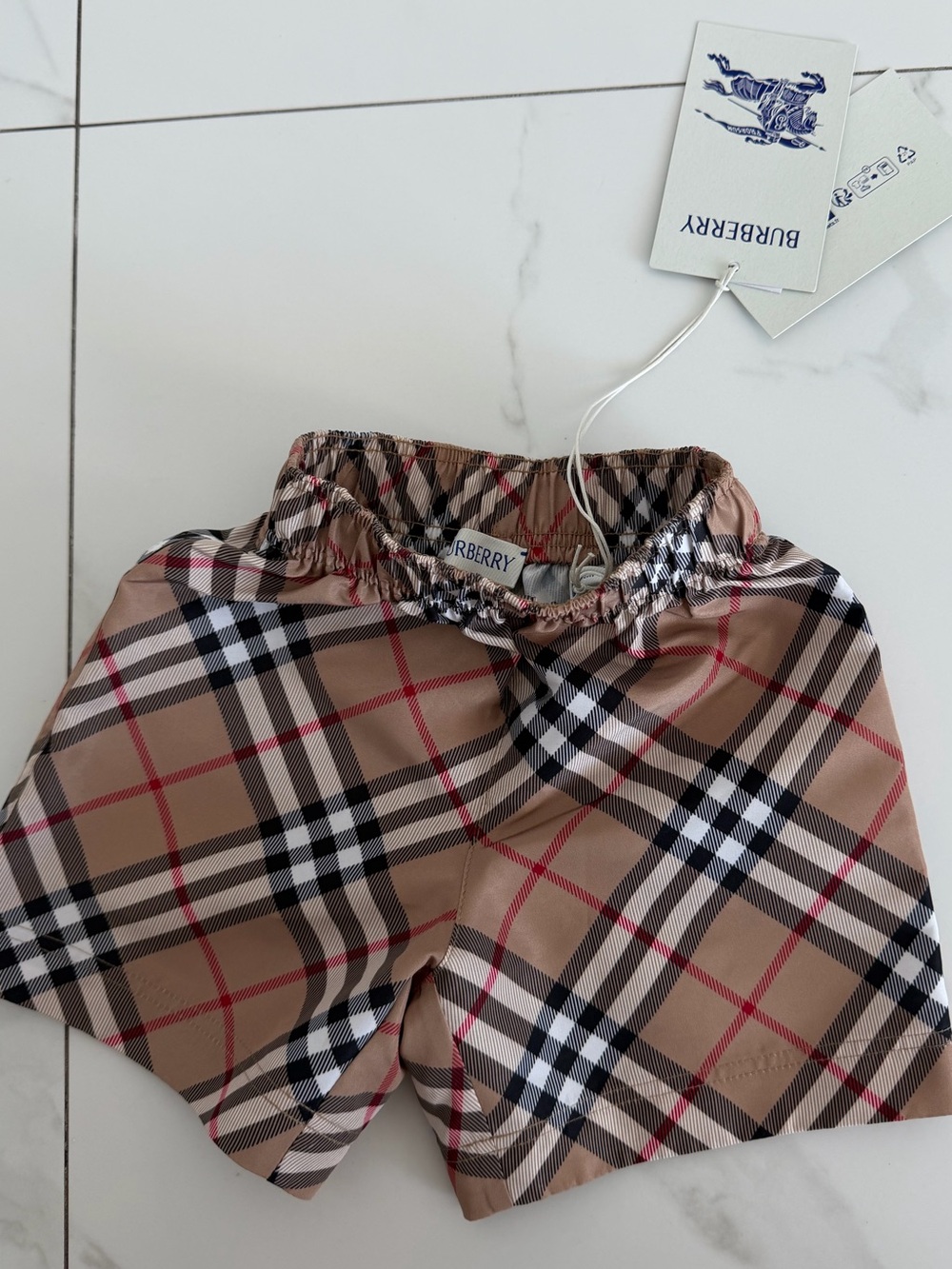 Burberry Beige Plaid Kids Swim Trunks with Red & Black Accents